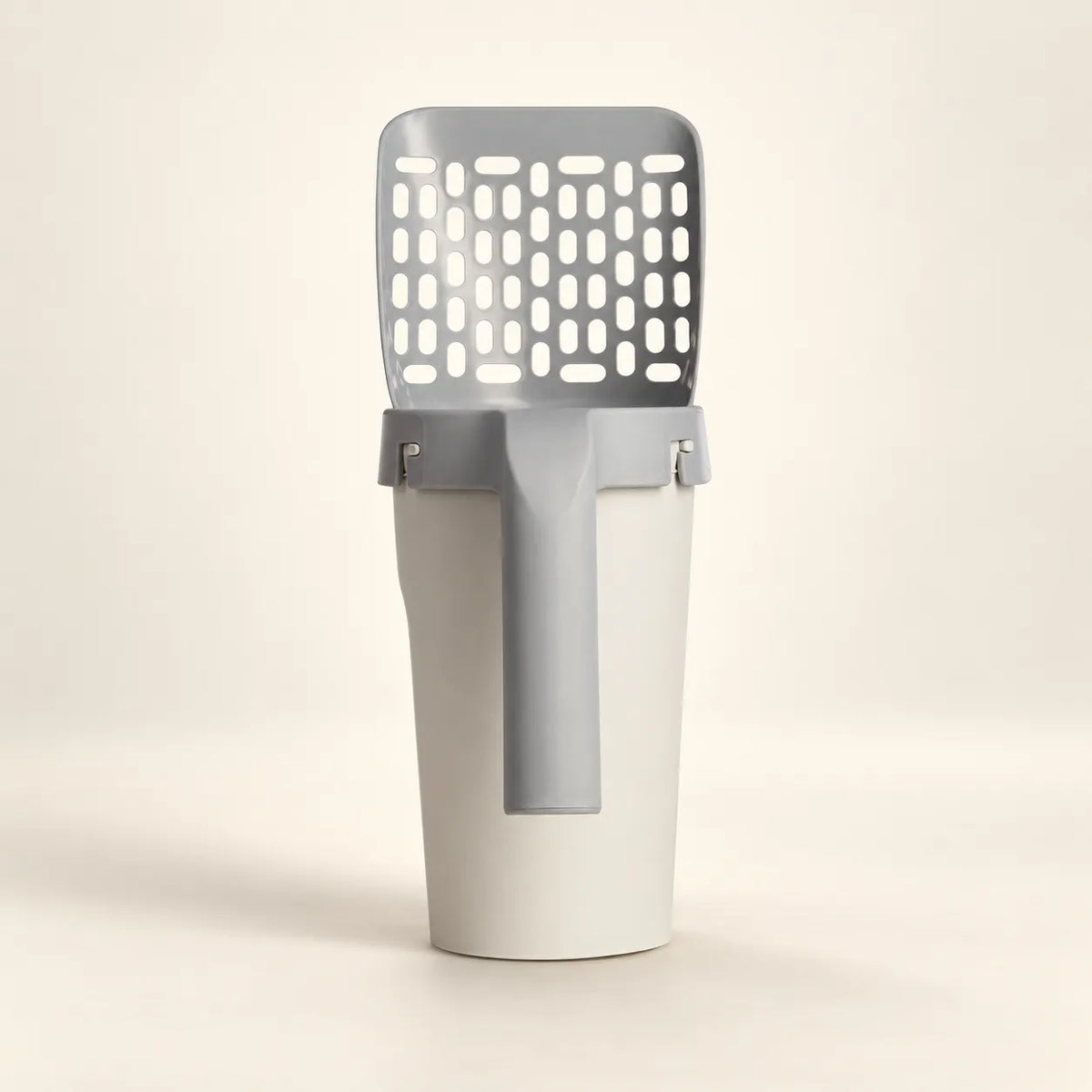 Litter Scoop with Storage standing in its storage base